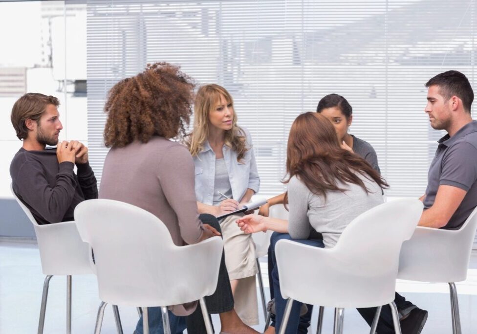 Group discussion seated in a circle.